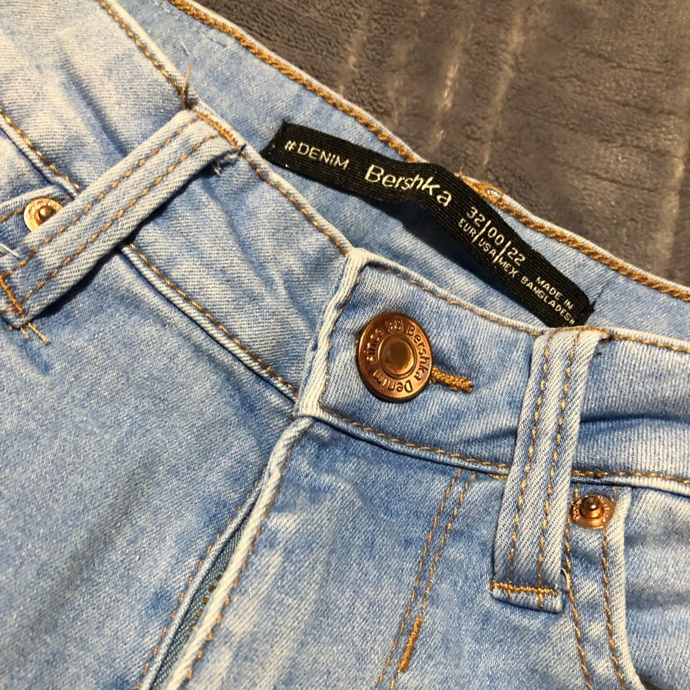 High rise light berskha blue jeans.